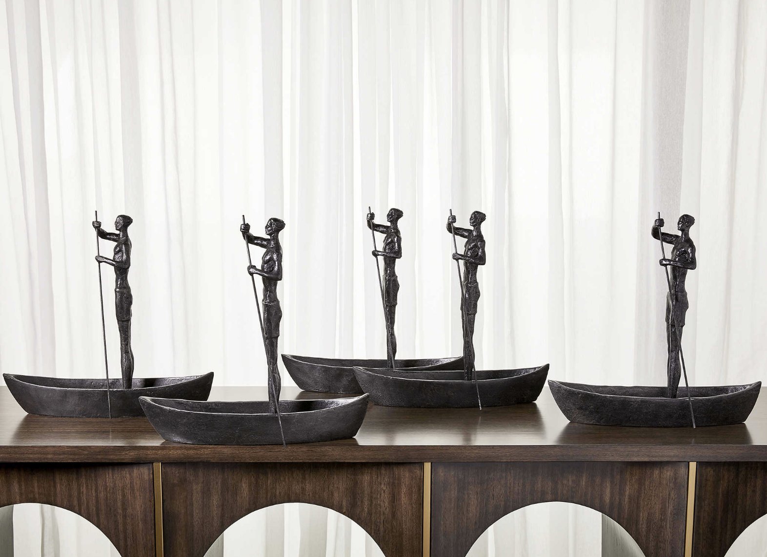 Impactful Metallic Standing Sculptures